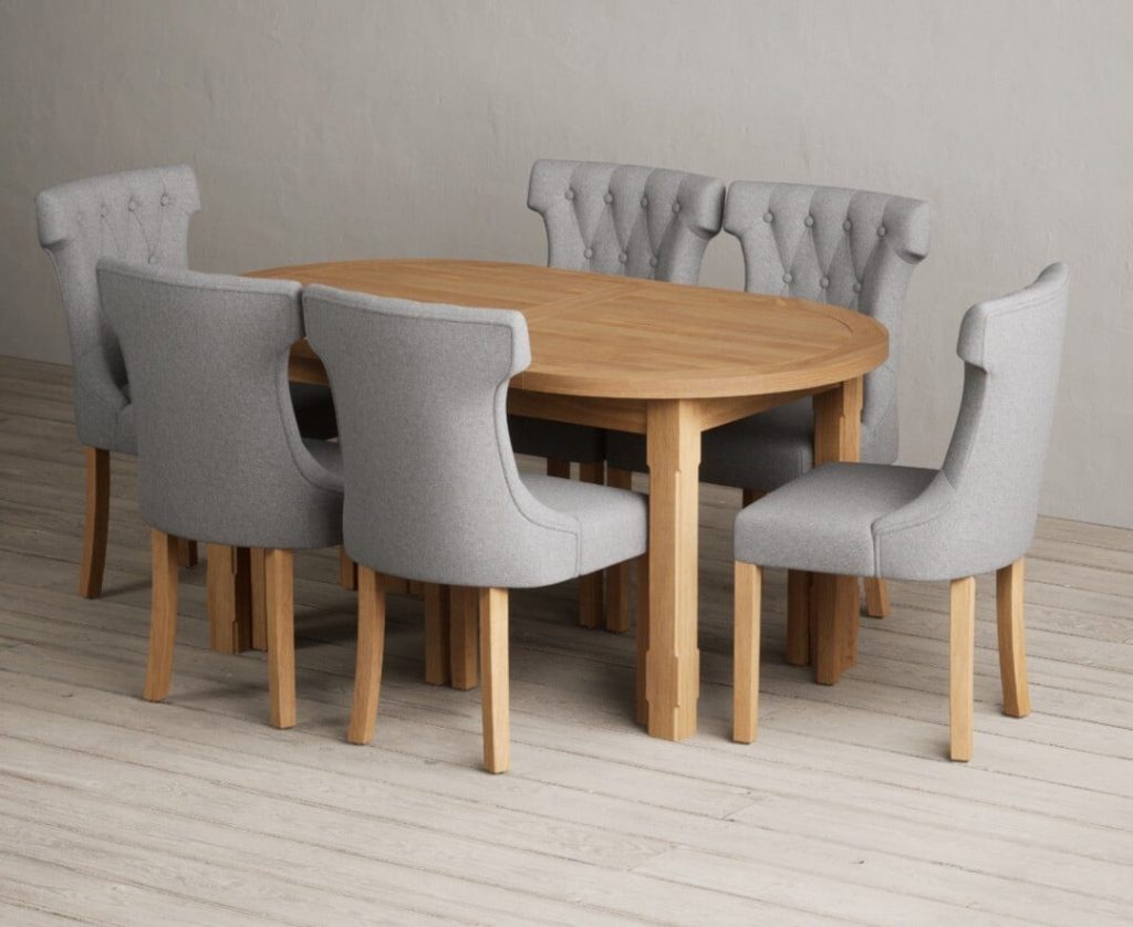 Extending Caversham Oak Oval Dining Table with 10 Grey Clara Chairs