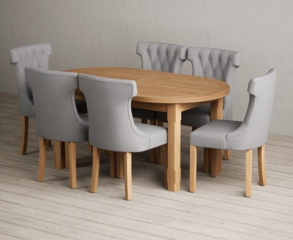 Extending Caversham Oak Oval Dining Table with 10 Natural Clara Chairs | Bed Sava