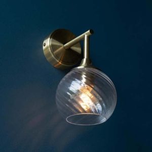 Accra Clear Spiral Glass Shade Wall Light In Antique Brass | Bed Sava
