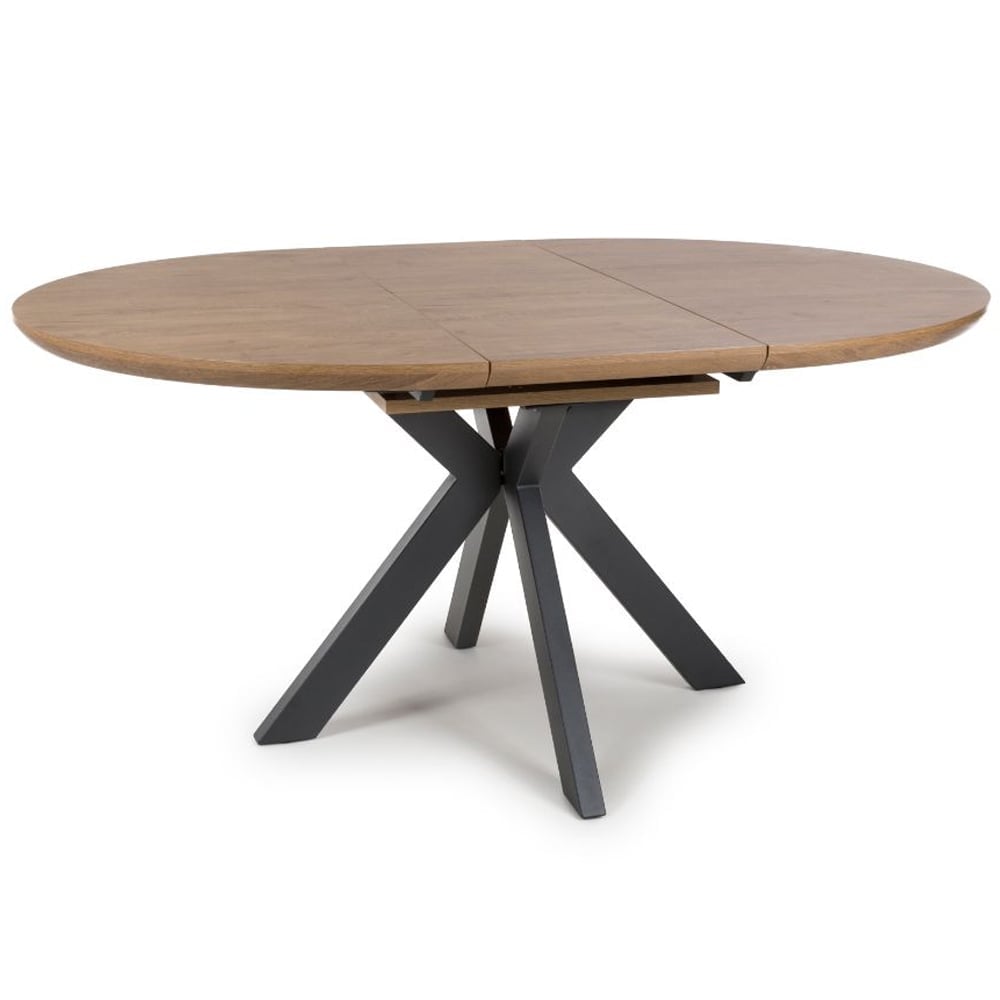 Beloit Wooden Round Extending Dining Table In Rustic Oak