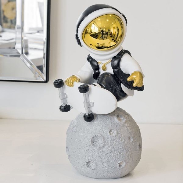 Nicolet Skateboarding Astronaut Sculpture In Black White And Gold | Bed Sava